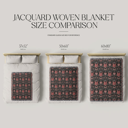 Luxurious woven cotton throw blanket featuring symmetrical scarab beetle pattern in terracotta on black background with white fringe detail. Perfect as gothic wall tapestry, dark academia decor, or cottagecore blanket for bedroom or living room.